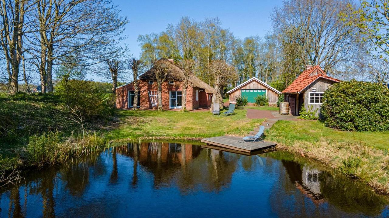Вилла Reetdach Ostfriesenhaus Sudbrookmerland Экстерьер фото